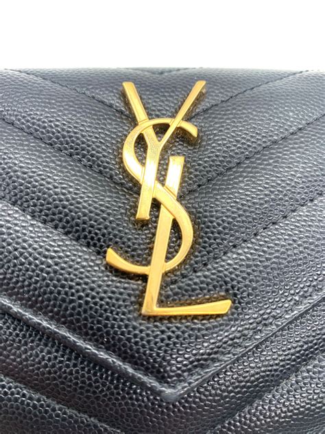 cartera de mano yves saint laurent|monederos santo laurent.